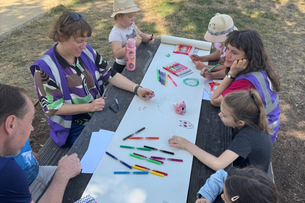 Family group doing art activity at Upton Country Park